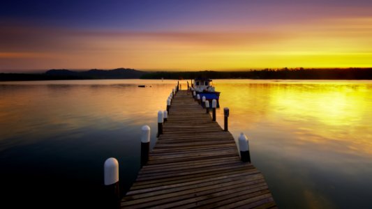 Wooden Dock At Sunset photo
