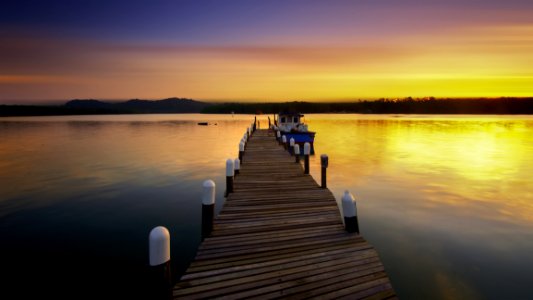 Wooden Dock At Sunset