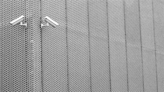 Security Cameras On Aluminum Fence photo