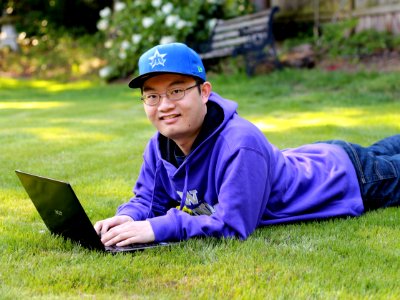 Guy Relaxing With Laptop photo
