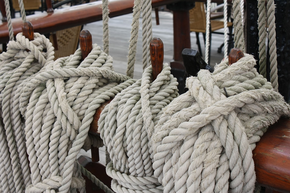 Knitting cordage fixing