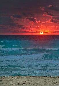 Sunset sand ocean photo