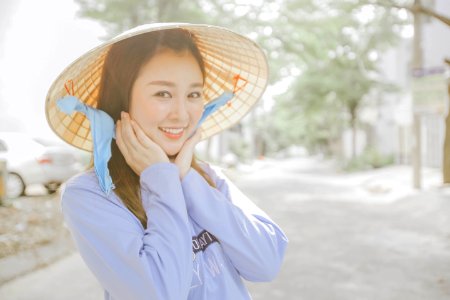 Asian Girl With Traditional Hat photo