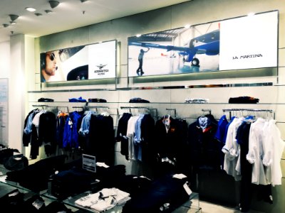 Clothes Hanging In Store photo