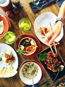 Person Eating Using Chopsticks photo