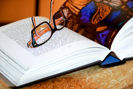Open Book With Eyeglasses photo