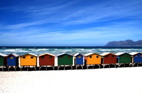 Colorful Cottages Near The Sea Under Blue Sky During Daytime