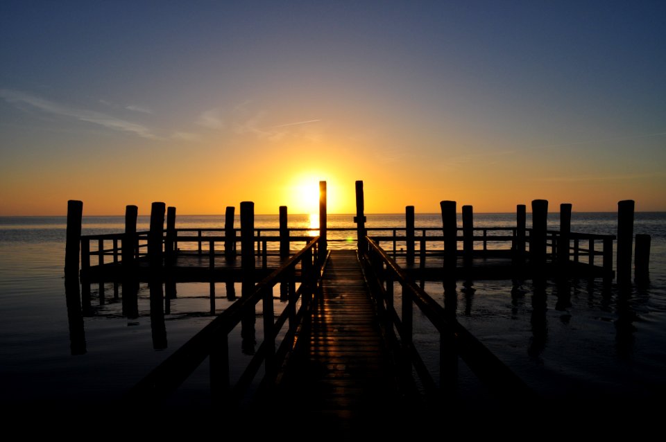 Wooden Pontoon At Sunset