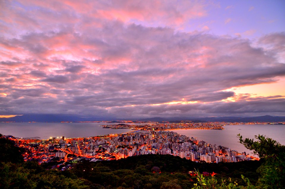 Photo Of City Buildings Taken Up On The Mountain During Dusk