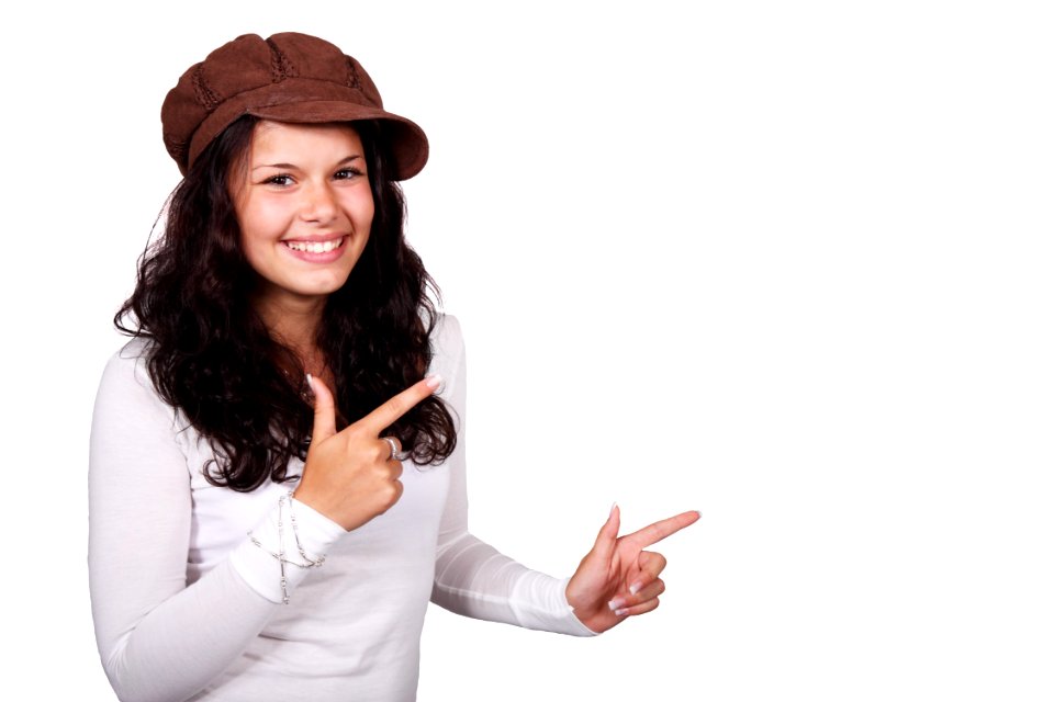 Woman In White Sweater Smiling With White Background