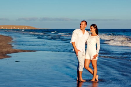 Man And Woman Near Seashore photo