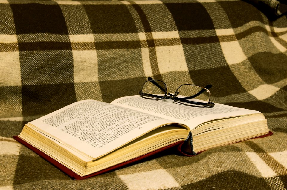 Close-up Of Book On Table photo