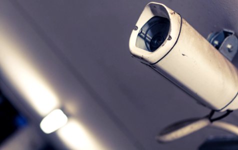 White And Gray Surveillance Camera In Macro Photography