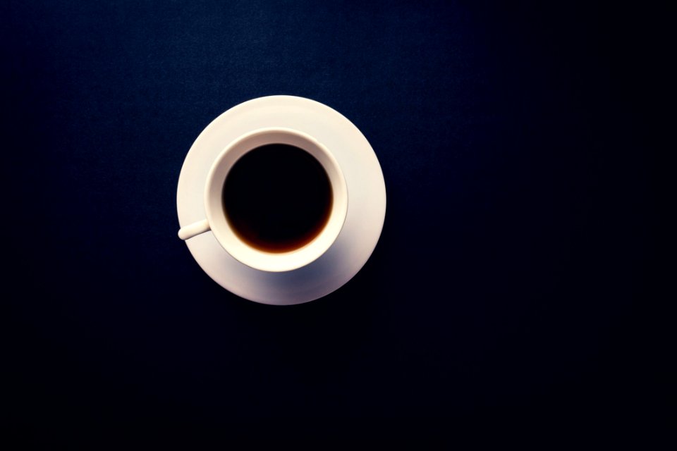 Cup And Saucer On Black