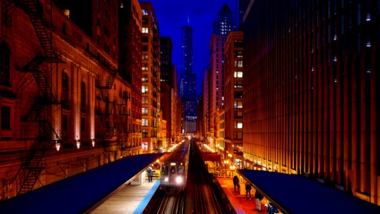 Train Platform In City At Night photo
