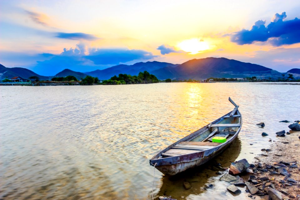 Boat On Shoreline At Dawn