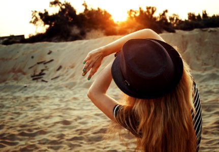 Woman With Hat On Beach photo