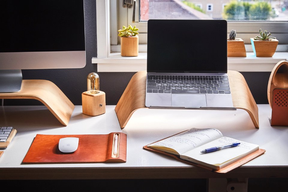 Desktop With Computer And Journal