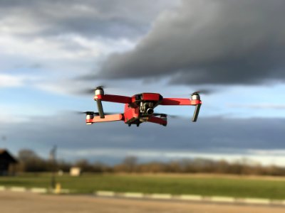 Drone Flying In Cloudy Skies