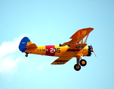 Airplane Flying Against Sky photo