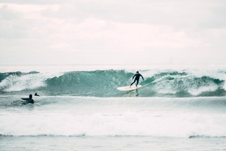 Surfers On Waves photo