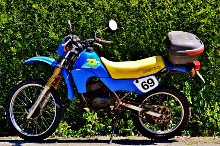 Blue And Yellow Suzuki Ts