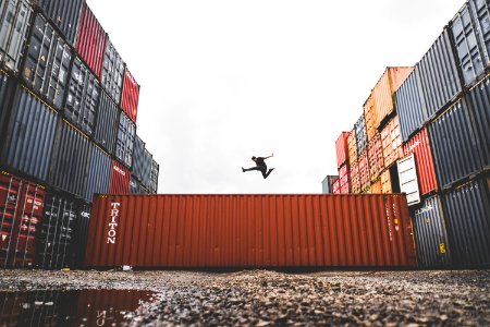 Athlete Jumping Over Containers