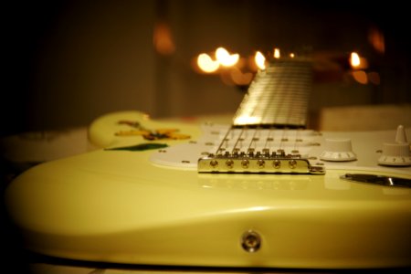 Yellow And White Stratocaster Electric Guitar photo