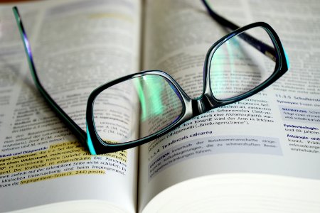 Eyeglasses On Book