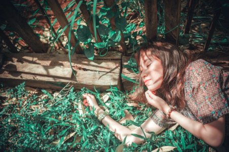 Woman Lying In Garden photo