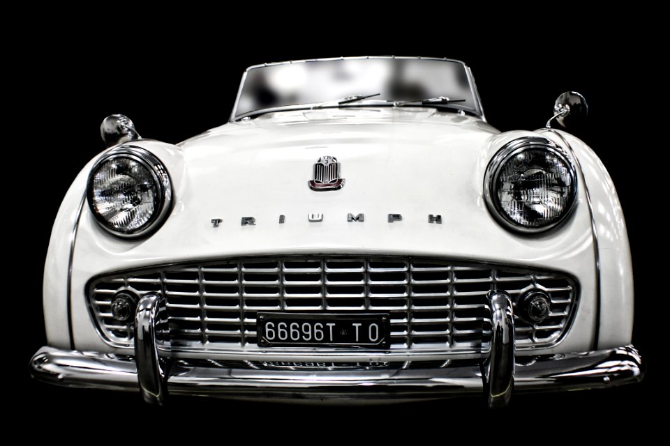 White Vintage Triump Sedan
