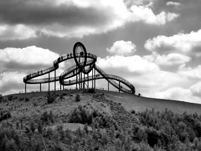 Black Roller Coaster In Grey Scale Photography photo