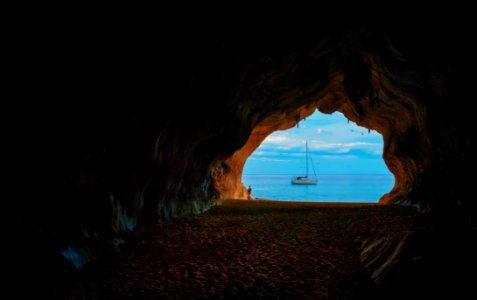 View Of Sailboat From Cave