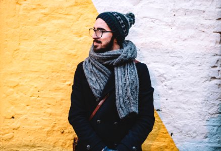 Man Wearing Scarf And Cap photo