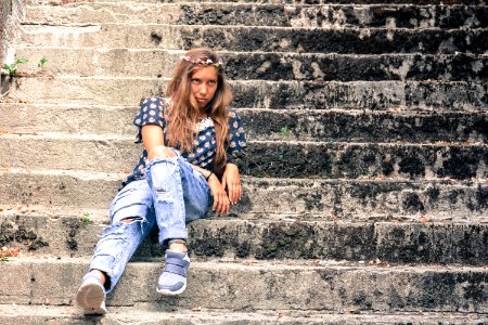 Woman Sitting On Stairs photo