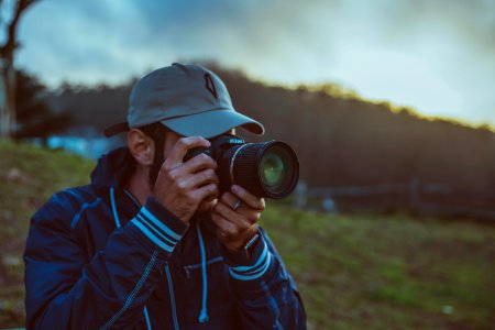 Man With Camera Outdoors