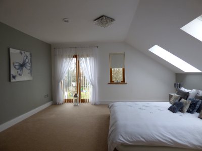 Bedroom With Sloped Ceiling