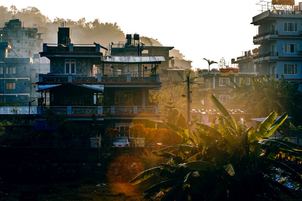 Outside Of Houses At Sunset