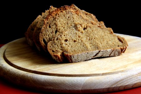 Brown Bread On Round Wooden Tray photo