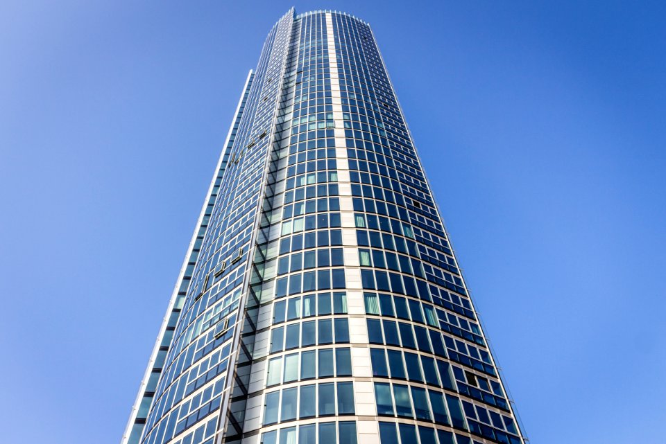 Modern Skyscraper Against Blue Skies photo