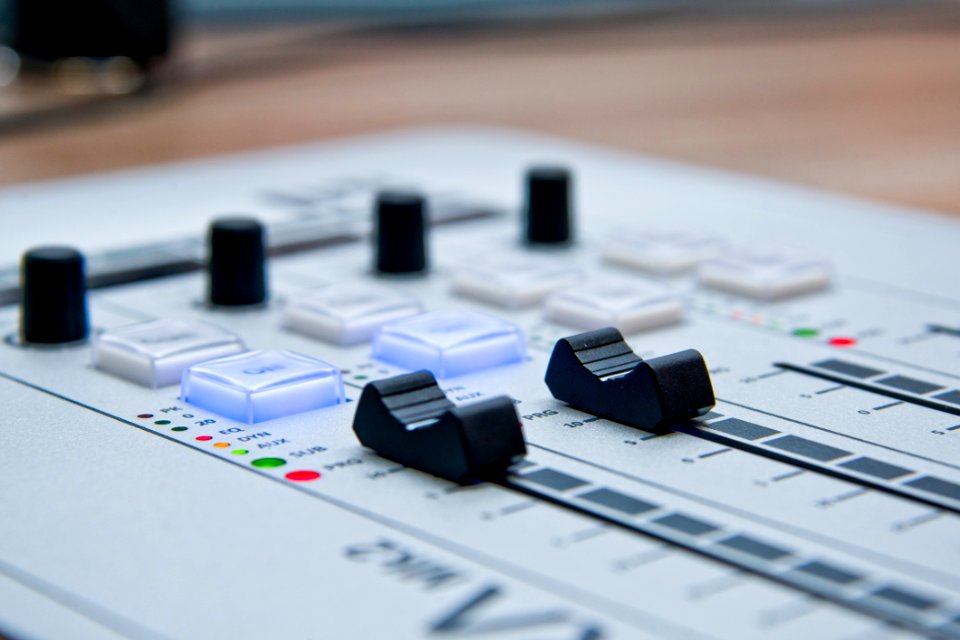 White Audio Mixer With Dial Turned Up
