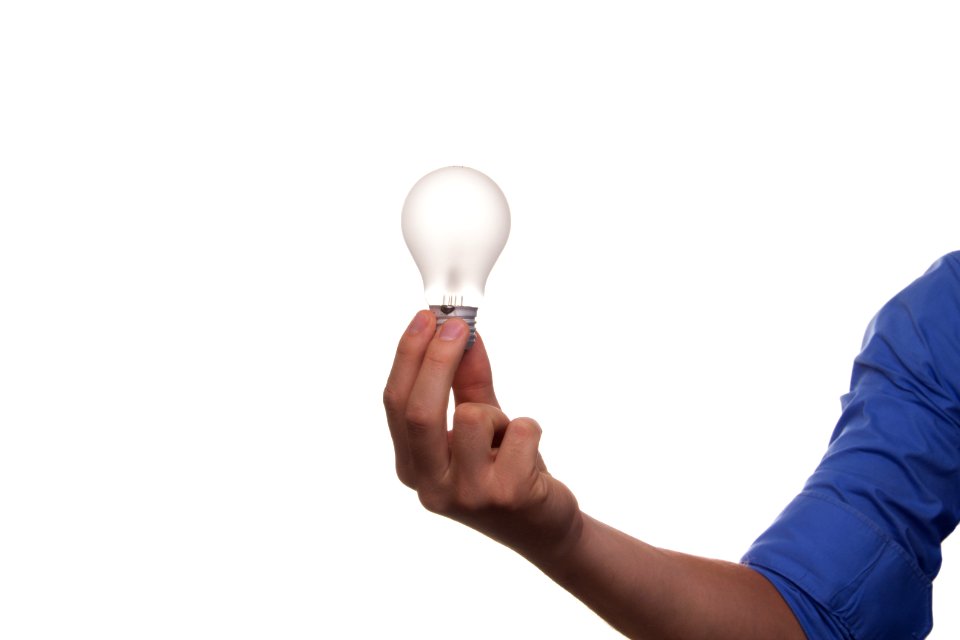 Midsection Of Man Holding Hands Over White Background