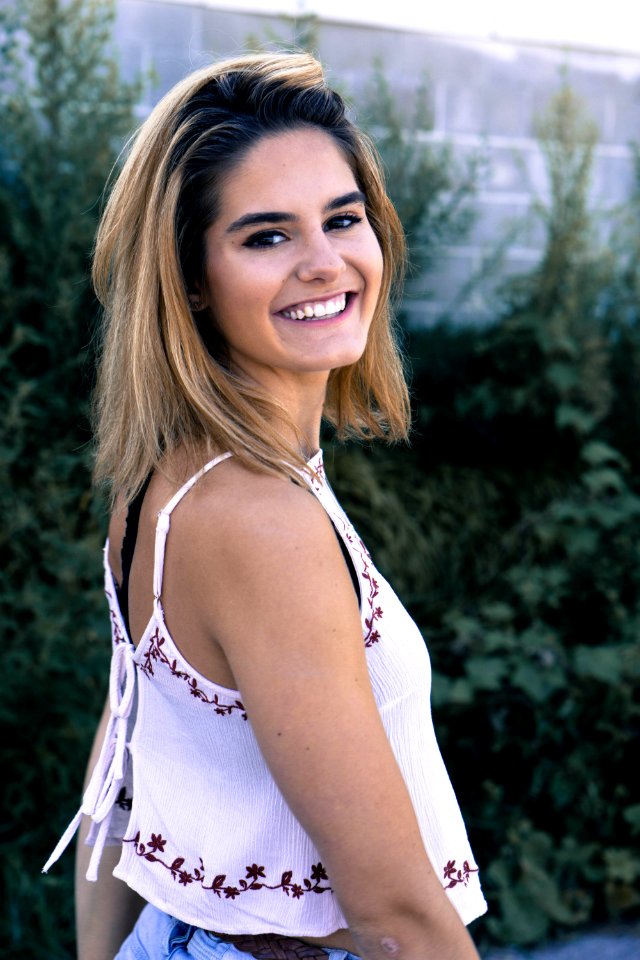 Happy Young Woman In Garden photo