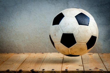 Soccer Ball Over Wooden Boards