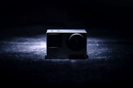 Small Camera On Black Fabric photo