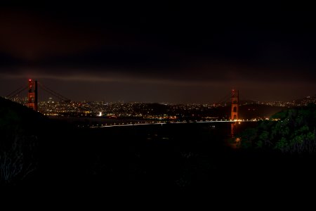 City Bridge Over River At Night photo