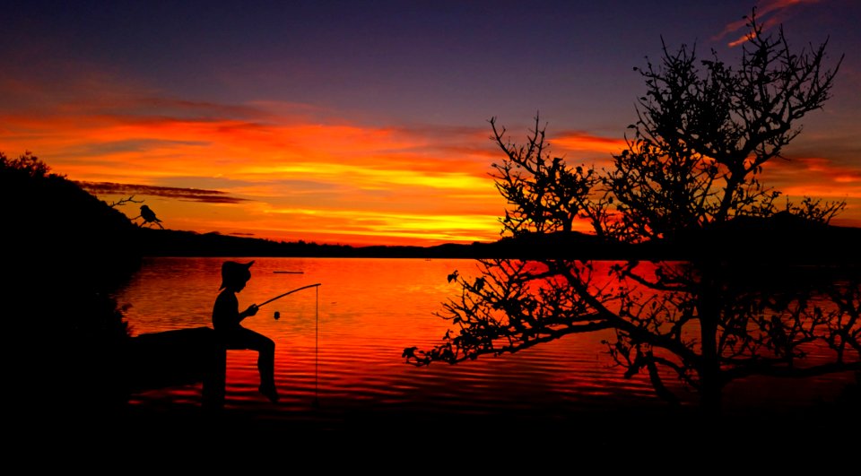 Fisherman At Sunset photo