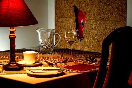 Brown And Red Table Lamp Near White Ceramic Mug photo