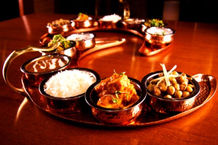 Tray Of Indian Dishes On Table