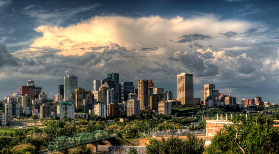 City Skyline Against Cloudy Skies photo